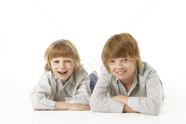 Foto d'archivio: Due · giovani · ragazzi · stomaco · studio · bambini