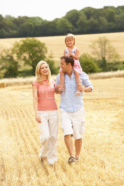 Family Walking Together Through Summer Harvested Field Stock photo © monkey_business