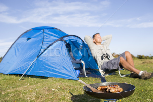 男 キャンプ 屋外 料理 笑みを浮かべて 休日 ストックフォト © monkey_business