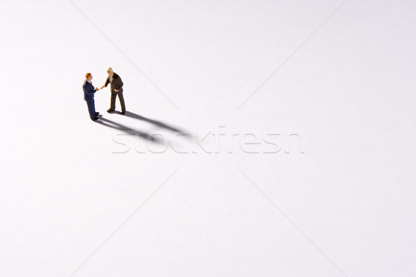 Figurines Of Two Businessmen Shaking Hands Stock photo © monkey_business