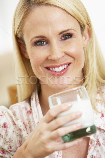 Adulto donna vetro latte sorridere Foto d'archivio © monkey_business