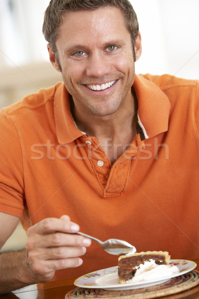 Middle Aged Man Eating Chocolate Cake Stock photo © monkey_business