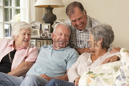 Family Sitting With Senior Woman In Hospital Stock photo © monkey_business