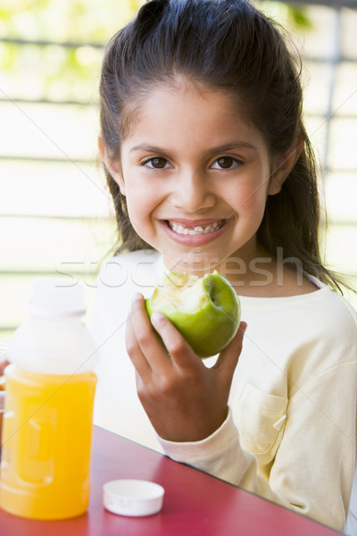 Girl eating lunch at kindergarten  Stock photo © monkey_business