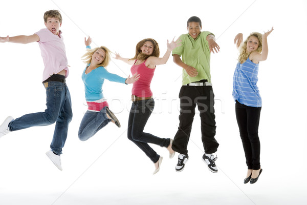 Teenagers Jumping In The Air Stock photo © monkey_business