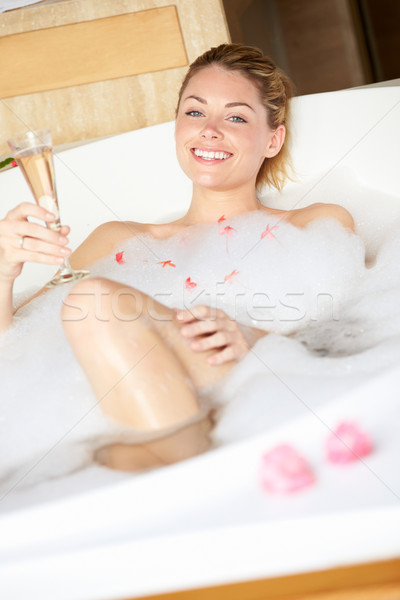 Woman Relaxing In Bath Drinking Champagne Stock photo © monkey_business