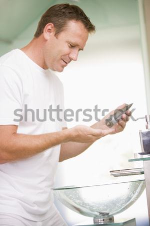 Man badkamer haren gel glimlachend sexy Stockfoto © monkey_business