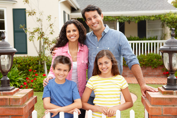 Stock photo: Hispanic family outside home