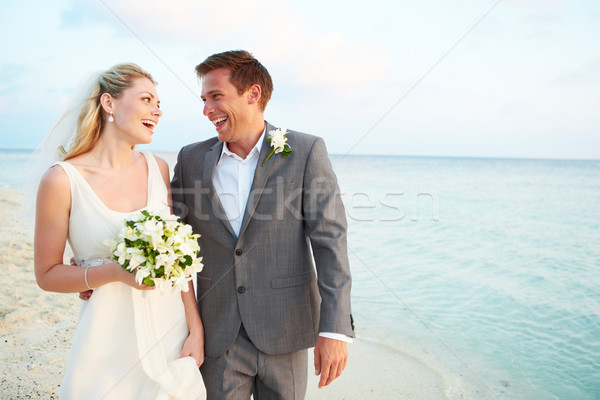 Bride And Groom Getting Married In Beach Ceremony Stock photo © monkey_business