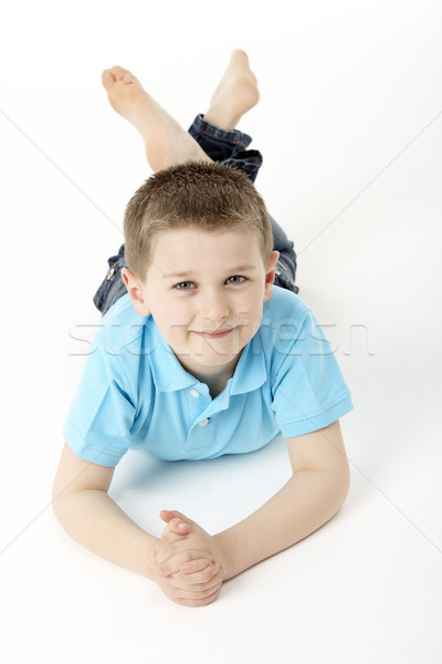 Young Boy Lying On Stomach In Studio Stock photo © monkey_business