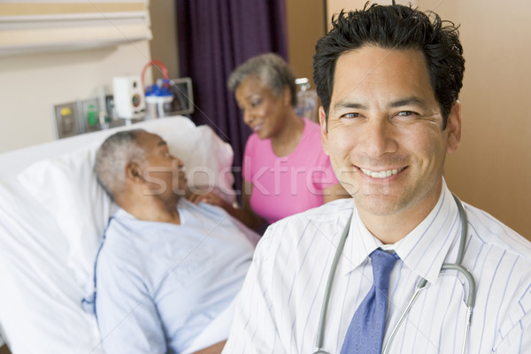 Doctor Looking Cheerful In Hospital Room Stock photo © monkey_business
