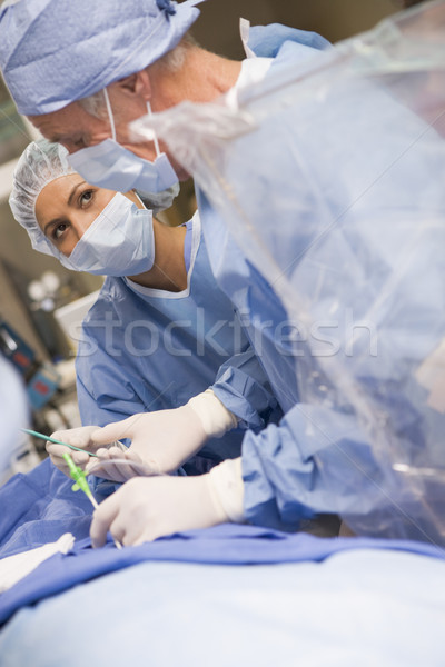 Foto stock: Cirujanos · paciente · mujer · hombre · hospital · medicina