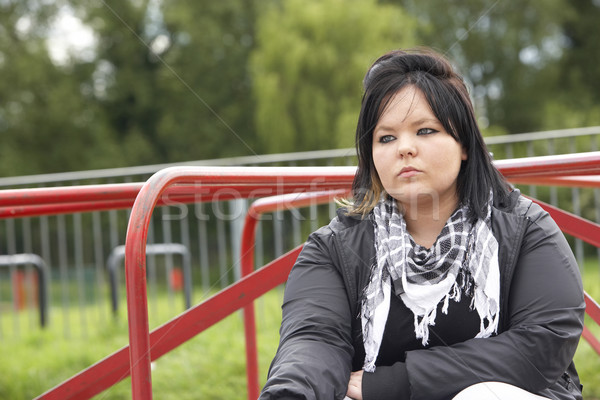 Young Woman Sitting In Playground Stock photo © monkey_business
