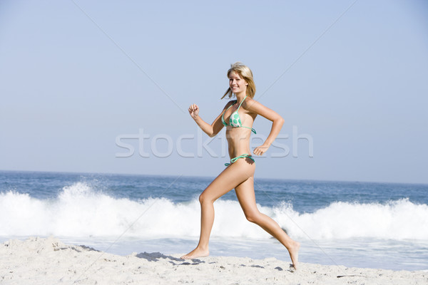 Stockfoto: Jonge · vrouw · strandvakantie · bikini · vrouw · strand