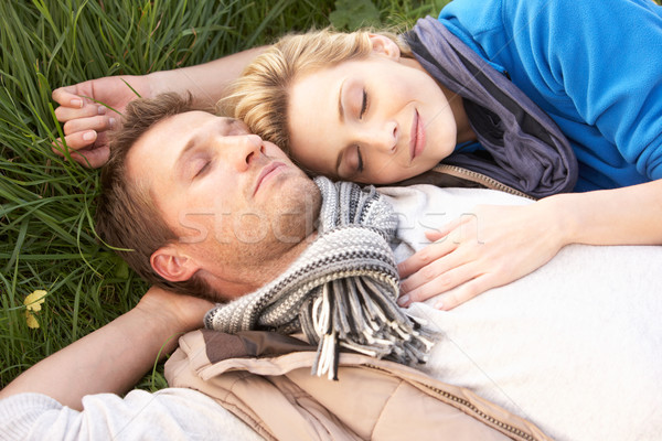 Young couple lying together on grass Stock photo © monkey_business