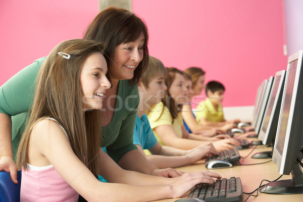 Teenage Students In IT Class Using Computers In Classroom With T Stock photo © monkey_business