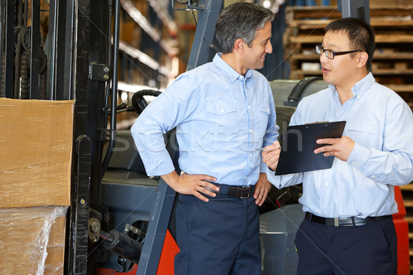 Stockfoto: Zakenlieden · vergadering · vork · lift · vrachtwagen · magazijn