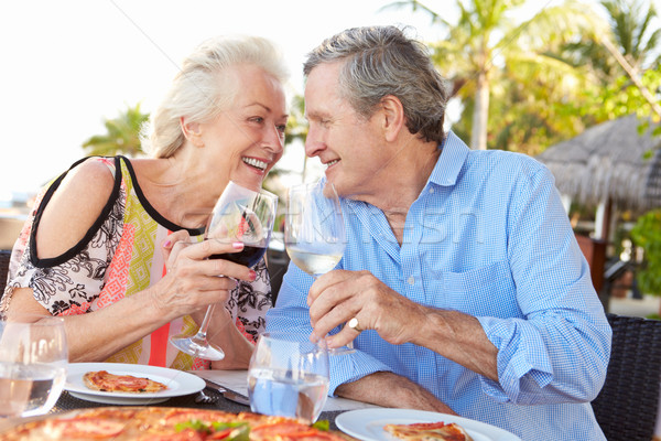 Idős pár élvezi étel szabadtér étterem bor Stock fotó © monkey_business