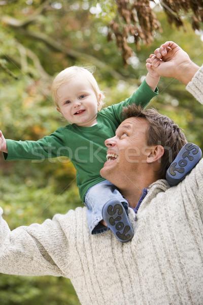 Apa fiatal fiú vállak kívül fa Stock fotó © monkey_business
