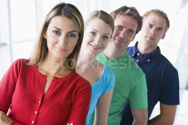 [[stock_photo]]: Quatre · personnes · permanent · couloir · souriant · homme · équipe