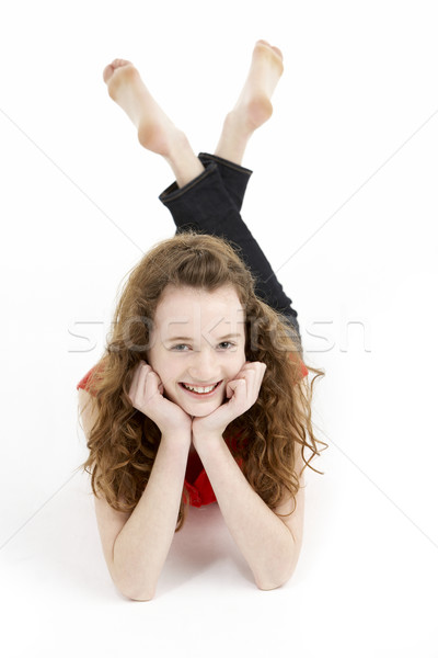 Stock photo: Young Girl Laying On Stomach