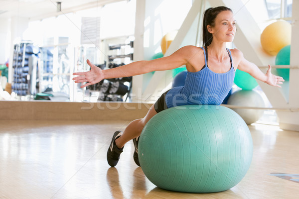 Nő egyensúlyoz labda boldog fitnessz tornaterem Stock fotó © monkey_business