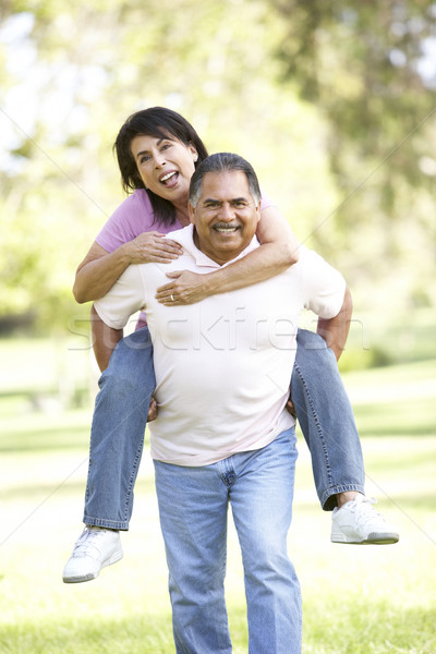 Senior Couple Having Fun In Park Stock photo © monkey_business