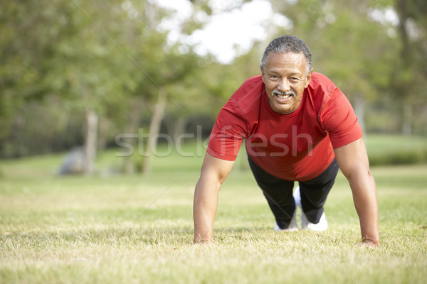 Stock photo: Senior Man Exercising In Park