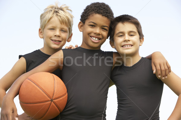 Fiatal srác játszik kosárlabda gyermek fiú denevér Stock fotó © monkey_business