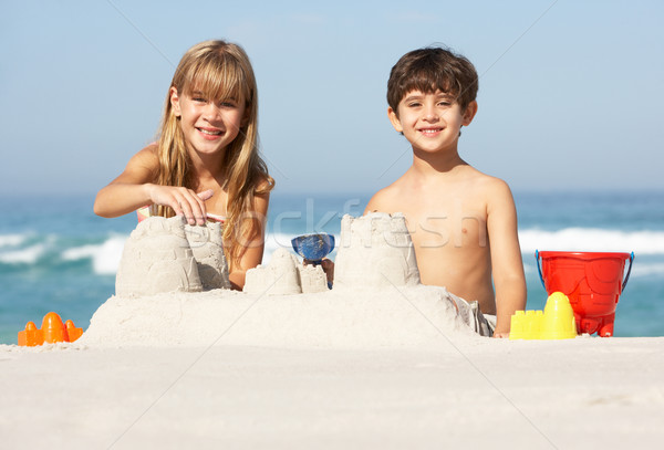 Kinder Gebäude Strandurlaub Familie glücklich Kind Stock foto © monkey_business