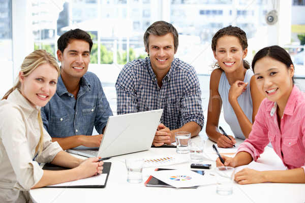 Mixed group in business meeting Stock photo © monkey_business