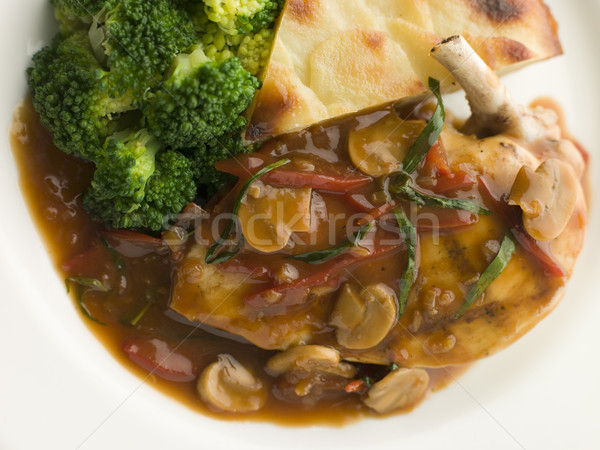 Sauteed Chicken Chasseur with Broccoli and Pomme Anna Stock photo © monkey_business