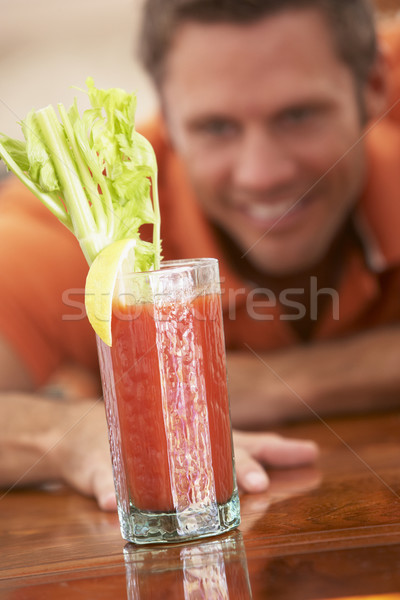Man Reaching For A Bloody Mary Stock photo © monkey_business
