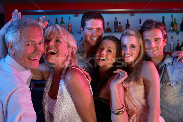 Group Of People Having Fun In Busy Bar Stock photo © monkey_business