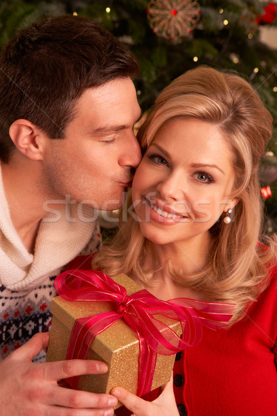 Couple Exchanging Christmas Gifts Stock photo © monkey_business