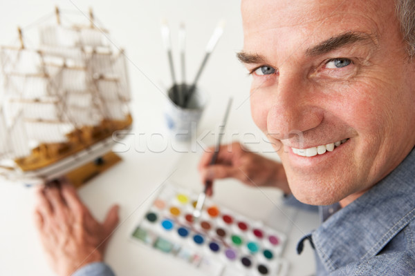 Mid age man model making Stock photo © monkey_business