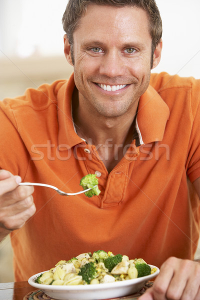 中年男子 健康飲食 餐 微笑 相機 年輕 商業照片 © monkey_business