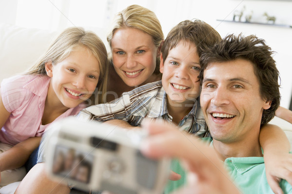 Stock photo: Family taking self portrait with digital camera
