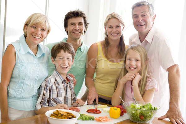 Famille ensemble femmes heureux cuisine mère Photo stock © monkey_business