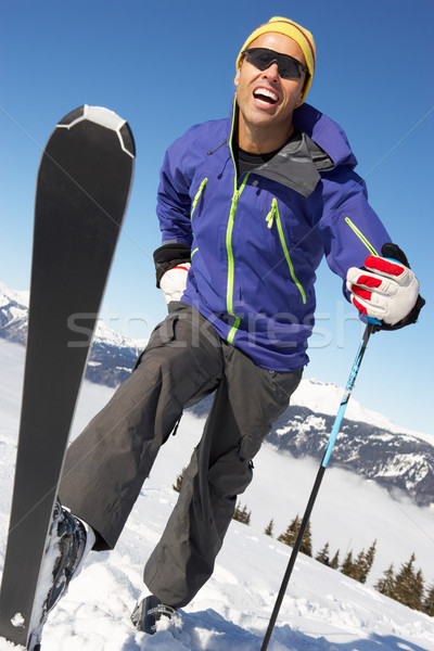 Masculin schior trece ţară fericit iarnă Imagine de stoc © monkey_business