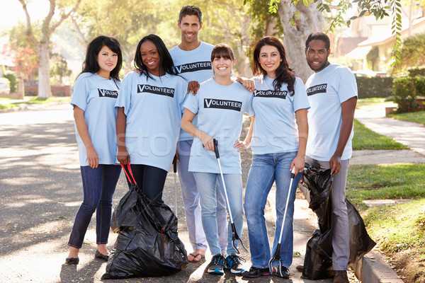 Team Of Volunteers Picking Up Litter In Suburban Street Stock photo © monkey_business