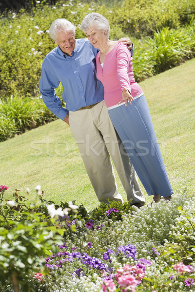 Senior couple standing in garden Stock photo © monkey_business