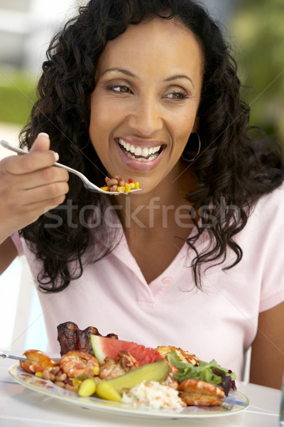 Middle Aged Woman Dining Al Fresco Stock photo © monkey_business