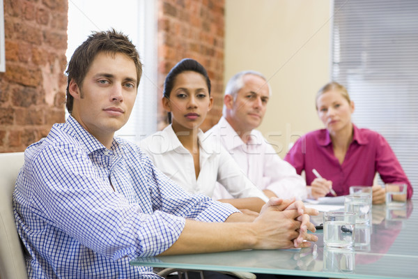 Four businesspeople in boardroom Stock photo © monkey_business