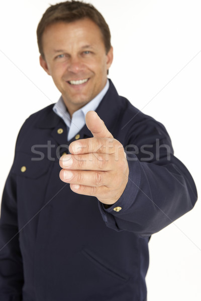 Futár kéz kézfogás mosolyog férfi hírnök Stock fotó © monkey_business