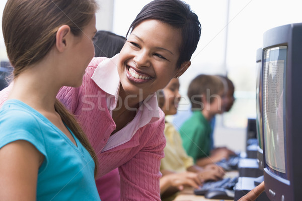 Escuela primaria ordenador clase maestro ninos feliz Foto stock © monkey_business