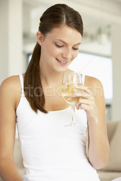 Fiatal nő élvezi üveg fehérbor nő bor Stock fotó © monkey_business