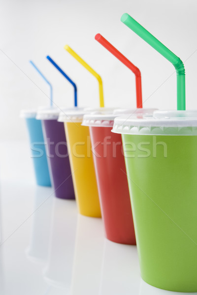Row Of Coloured Soft Drink Beakers With Straws Stock photo © monkey_business