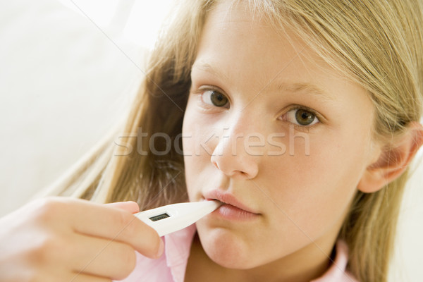 Girl Having Her Temperature Measured Stock photo © monkey_business