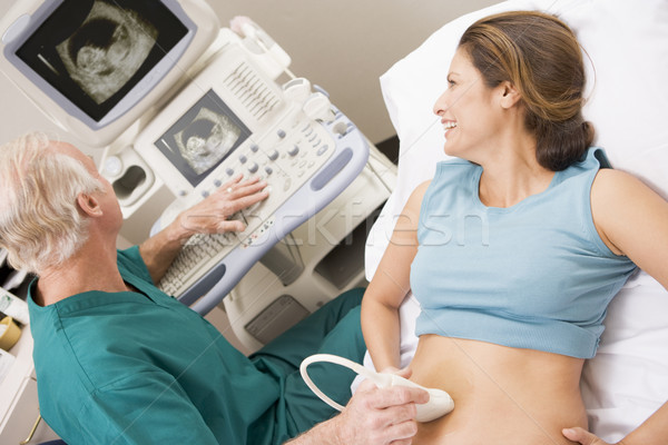 Doctor Giving Patient An Ultra Sound  Stock photo © monkey_business